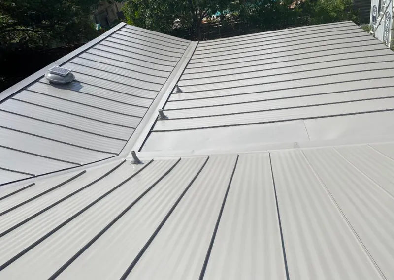 Solar attic fan installed on a metal roof for Roof Ventilation in North Lebanon